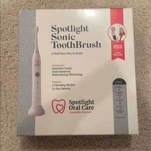 NEW spotlight oral care electric toothbrush